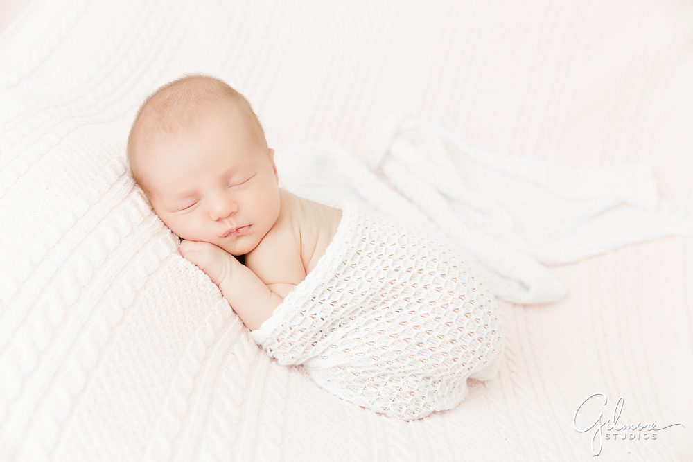 Maternity Newborn Photography, swaddling blanket, portrait studio, session package, baby asleep, white outfit, background, family