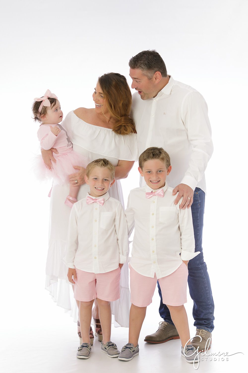 Ballerina Cake Smash Session, portrait photography, family shoot, parents, matching outfits, white, pink, bow tie, jeans, shorts, dress, siblings, sister, brothers