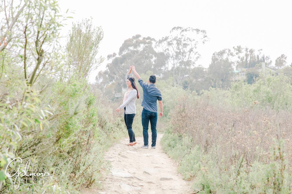Newport Beach, Corona Del Mar Beach Engagement Session, hiking, hike, buck gully trailhead, holding hands, engaged, couple, portrait, natural light