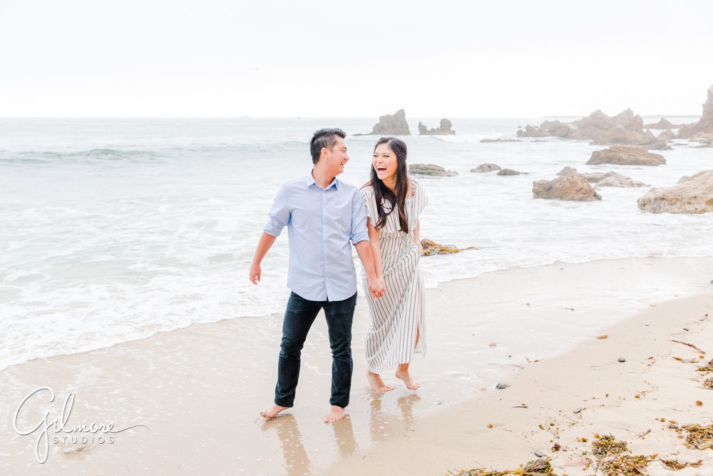 Corona Del Mar Beach Engagement Session, sand, surf, waves, ocean, dress, couple, engaged, walk on the beach