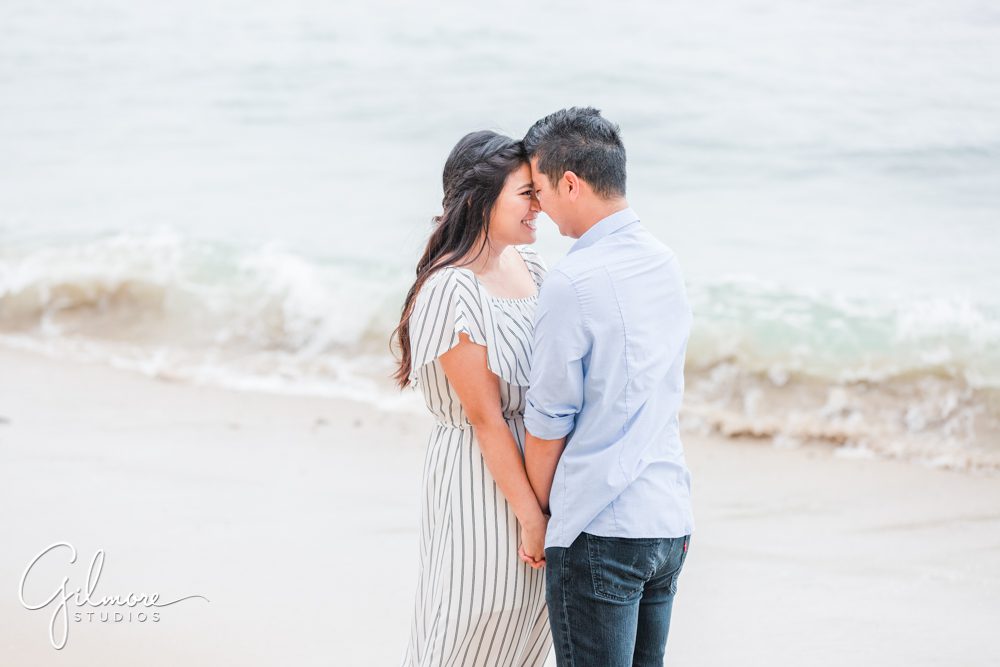 Corona Del Mar Beach Engagement Session, surf, waves, ocean, sand, dress, engaged, couple