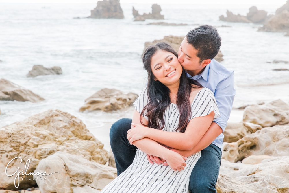 Corona Del Mar Beach Engagement Session, kiss, engaged, couple, dress, ocean, sand, waves