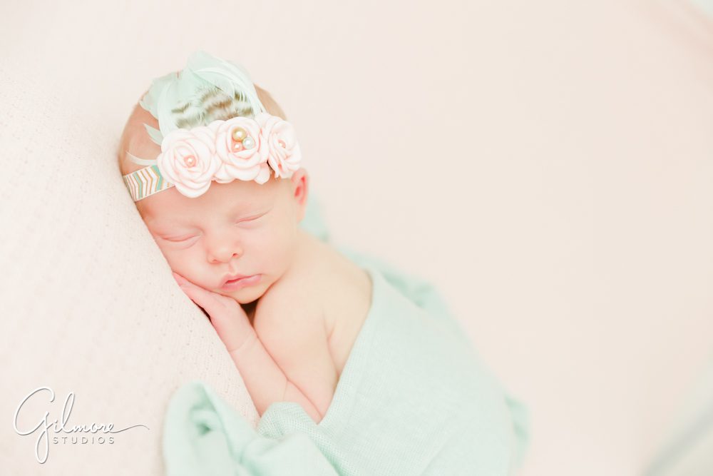 OC Newborn Studio, infant, baby, girl, blue blanket, pink, headband