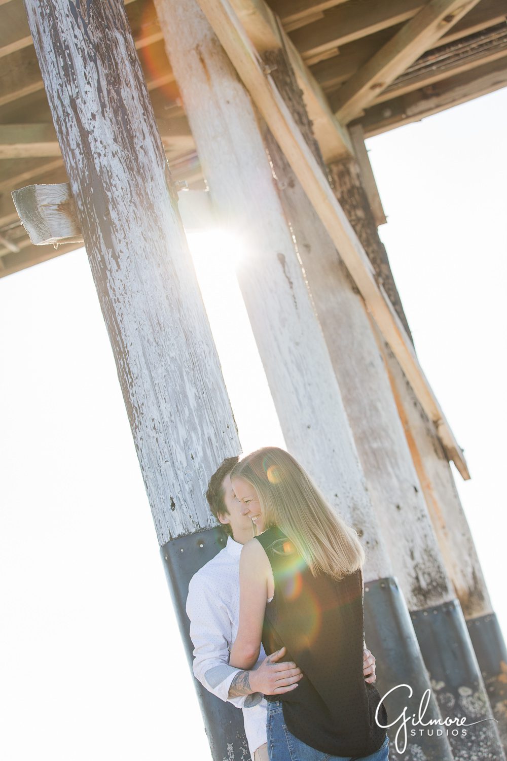 Engagement Photography Session at the beach, Newport Beach pier photo