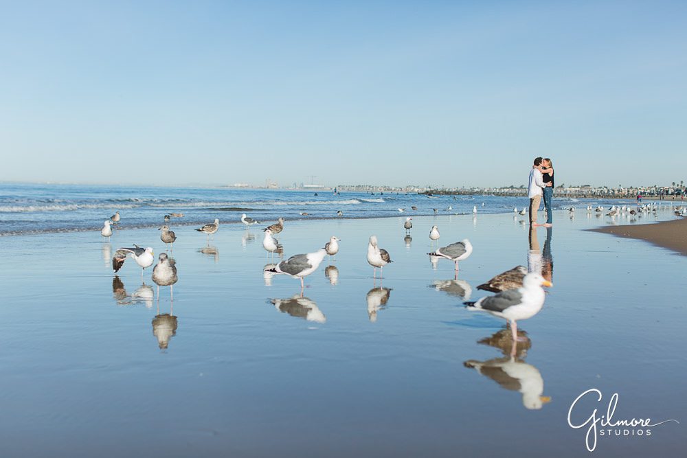 Engagement Photography Session at the beach, Newport Beach pier photo