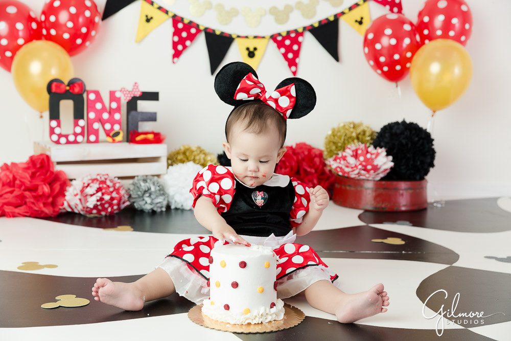 Minnie Mouse Cake Smash, first birthday outfit, Baby Photographer, First Birthday, 1st birthday party theme, Gilmore Studios, Orange County, Mickey Mouse smash cake