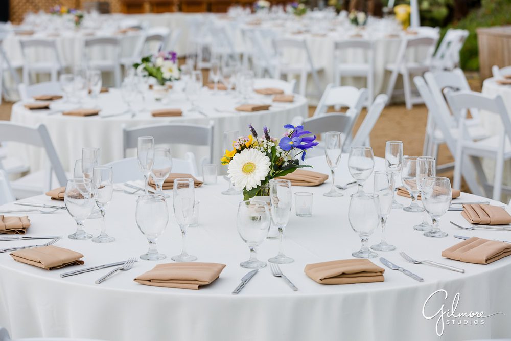 reception tables, linens, flowers, Crystal Cove Cottages Wedding Photography