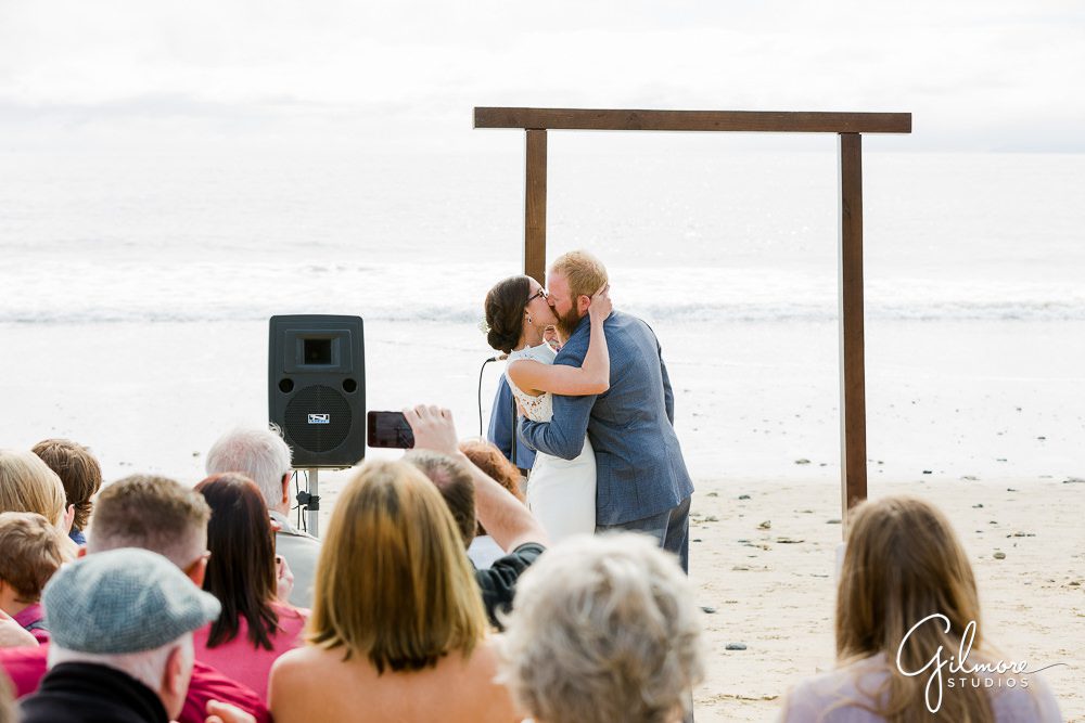 kiss, beach ceremony, Orange County, sand, ocean, photography, beaches, venue, OC, crystal cove cottages