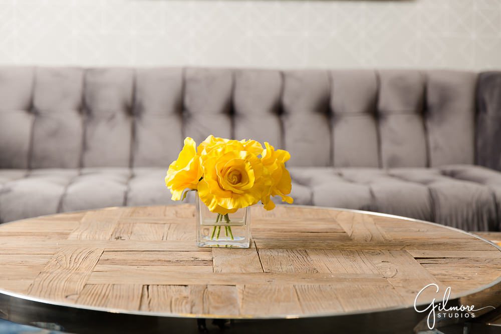 office furniture, lobby, grey sofa, yello flowers, floral
