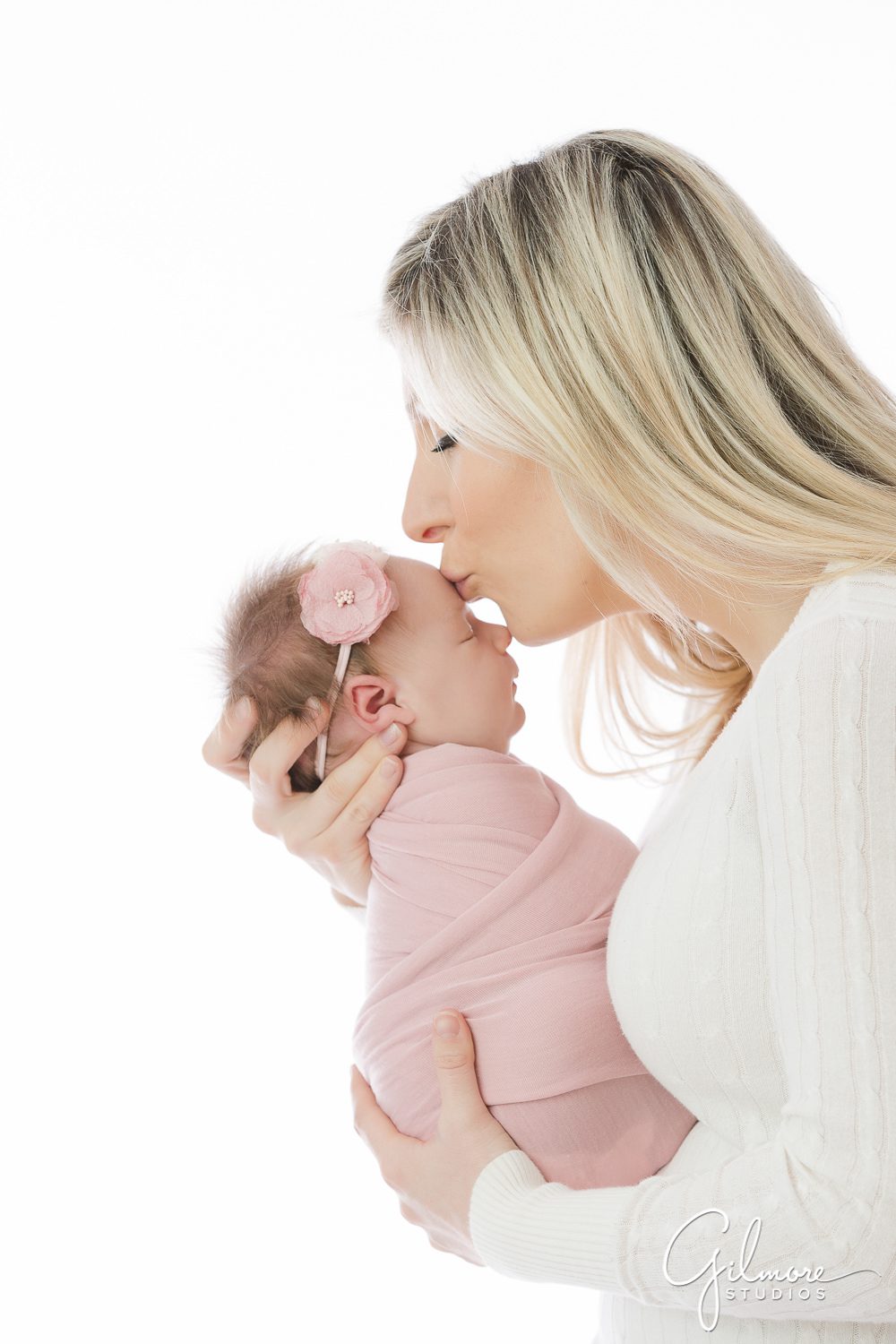 Newborn Family Photography Session, mother with baby, kissing,