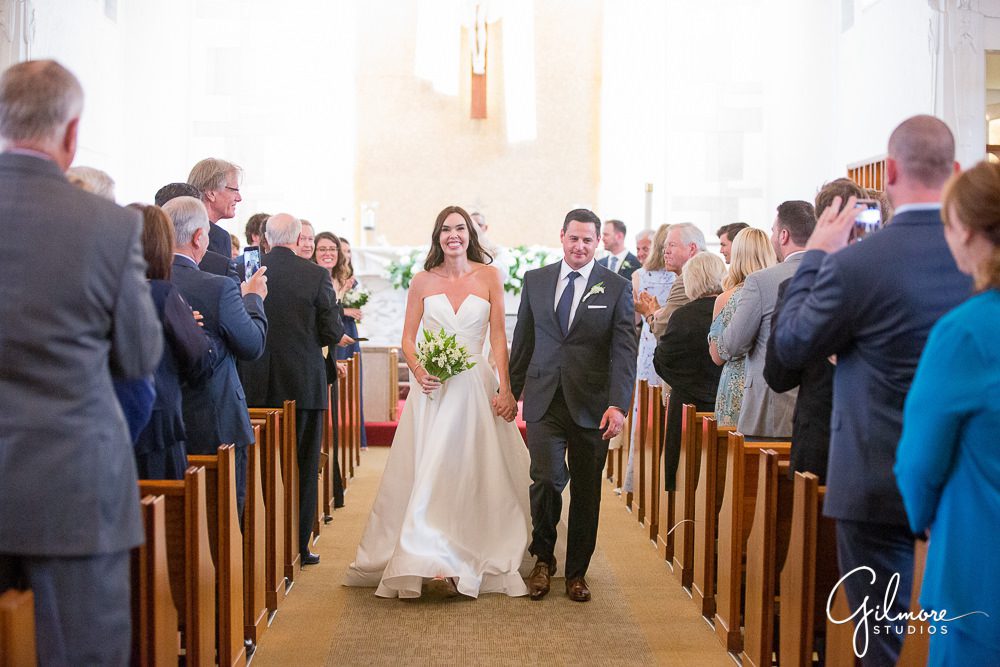 wedding-exit-down-aisle-church-ceremony-bride-groom-Our-lady-mount-carmel-newport-beach-traditional-wedding-photography-catholic-weddings