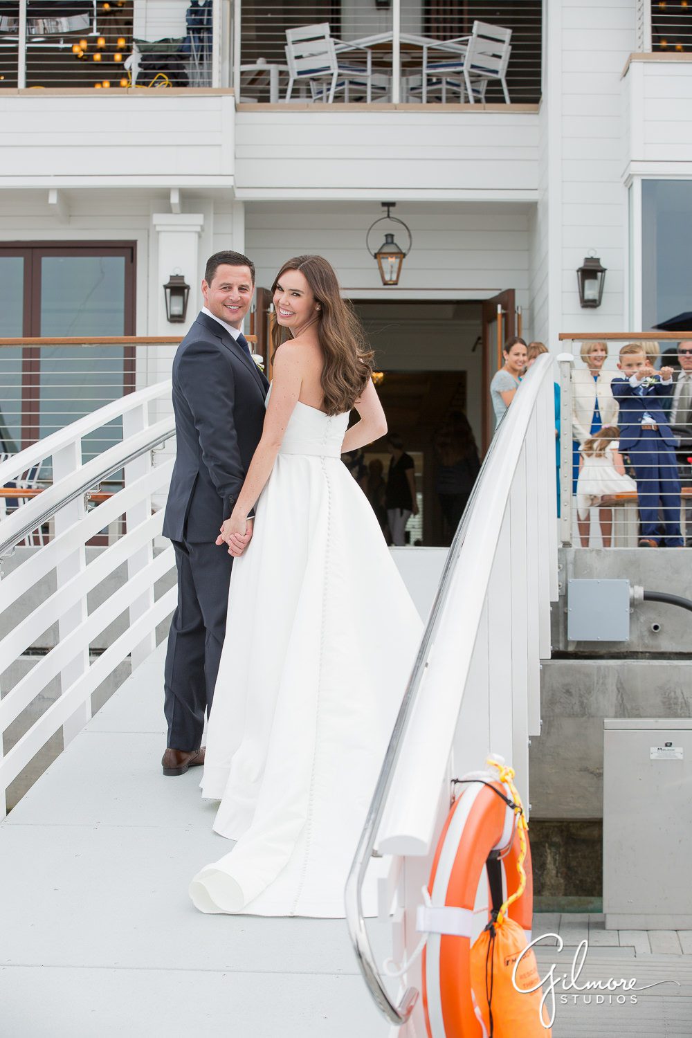 bride-groom-newport-harbor-yacht-club-wedding-reception-portrait-newport-beach-wedding-photographers