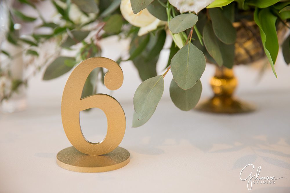 gold-table-numbers-wedding-reception-dining-room-tables-chairs-reception-floral-decor-the-bloom-of-time-florist-white-roses-arrangement-floral-design-newport-harbor-yacht-club-wedding
