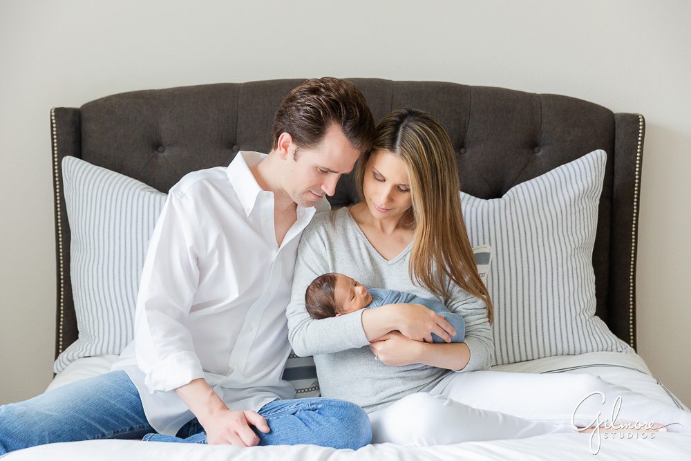 mom, dad, holding baby, Orange County Lifestyle Newborn Photographer