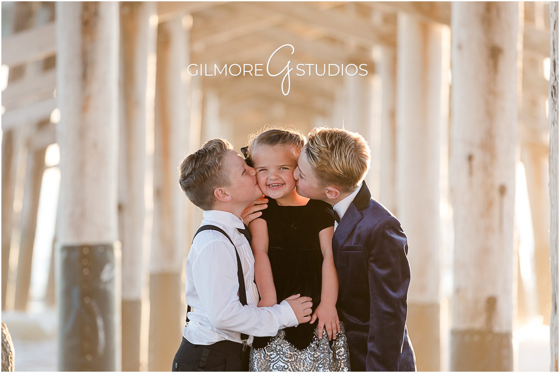 siblings, brothers, kissing sister, orange countyFormal Family Portrait, Newport Beach photographer