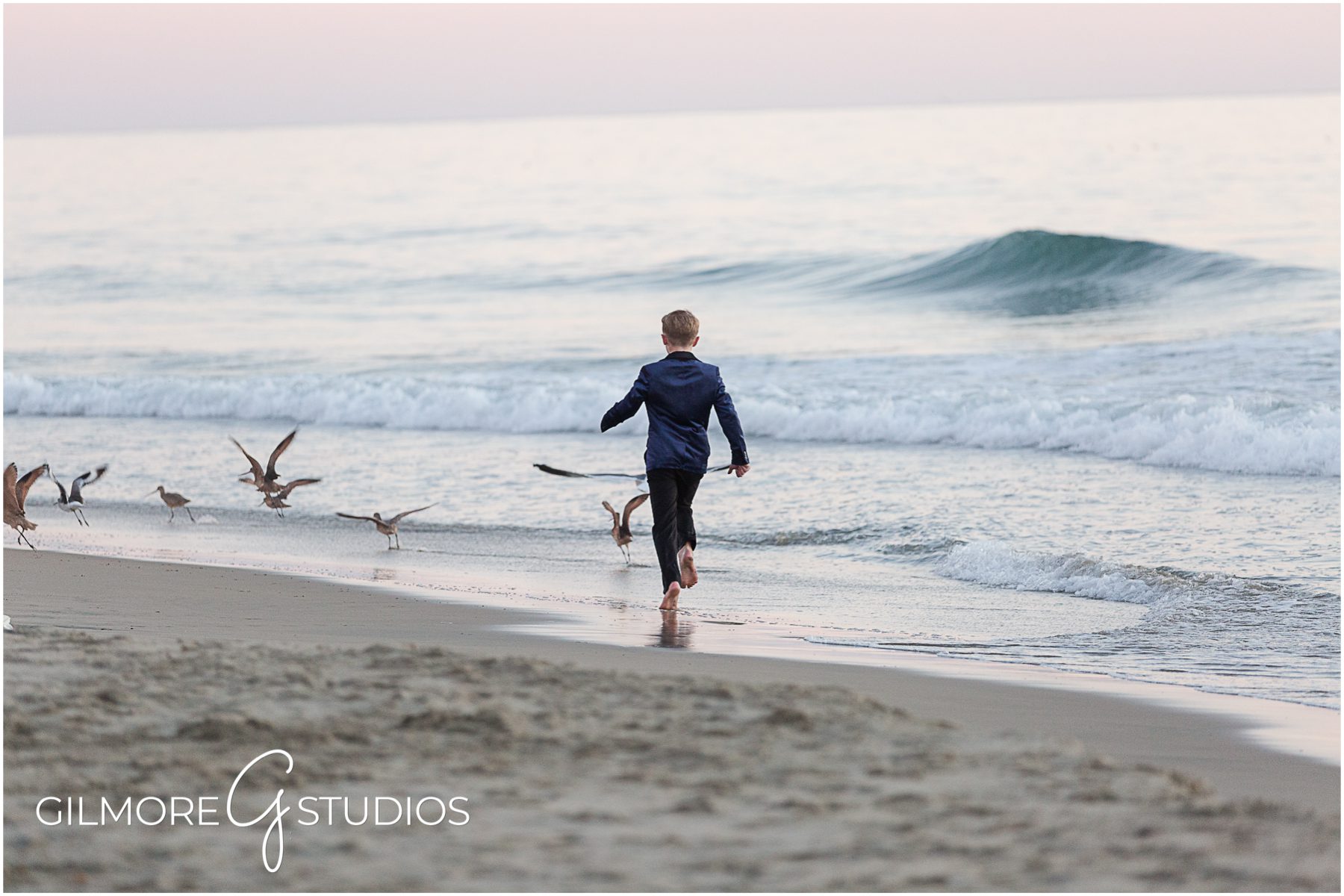 running on the beach, Formal Family Portrait, Newport Beach photographer