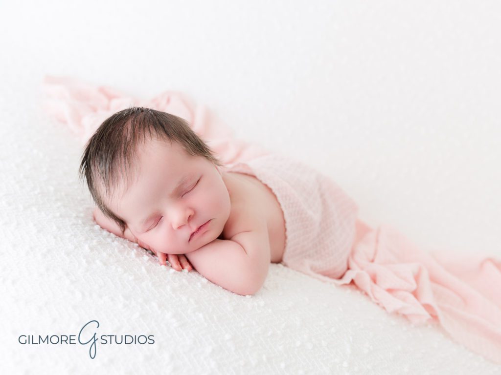 Newborn Baby Girl - Newport Beach Baby Photographer, pink blanket, props, posing, it's a girl, orange county baby studio Newport Beach, CA