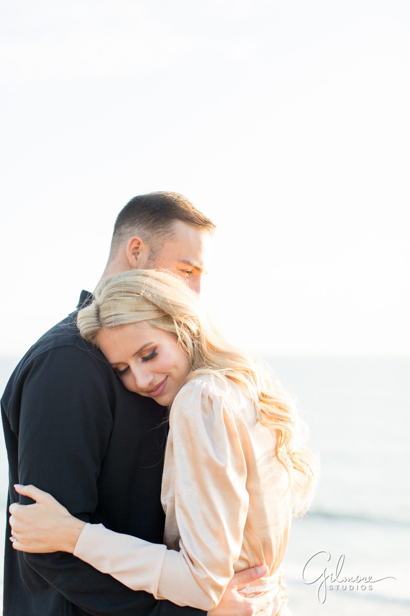 Crystal Cove Engagement Photography Session, Newport Beach, cute short dress, outfit, outfits, skirt, Orange County wedding photographers, Gilmore Studios, love, couple, hug, cuddle, kiss