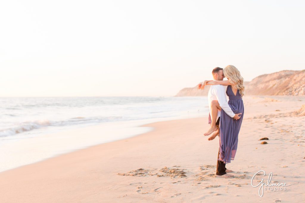 Crystal Cove Engagement Photography Session, Newport Beach, cute formal dress, outfit, outfits, skirt, romantic, sexy, private beach, Orange County wedding photographers, Gilmore Studios