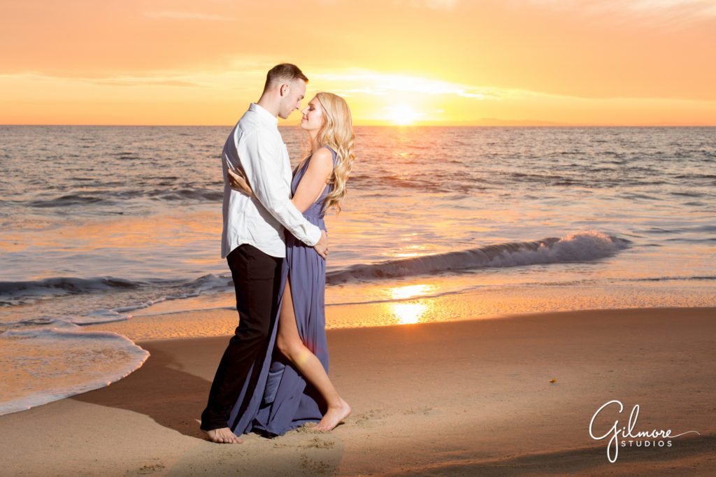 Crystal Cove Engagement Photography Session, Newport Beach, cute short dress, outfit, outfits, skirt, Orange County wedding photographers, Gilmore Studios, sunset, lighting, canon speed lite, photo, off camera strobe