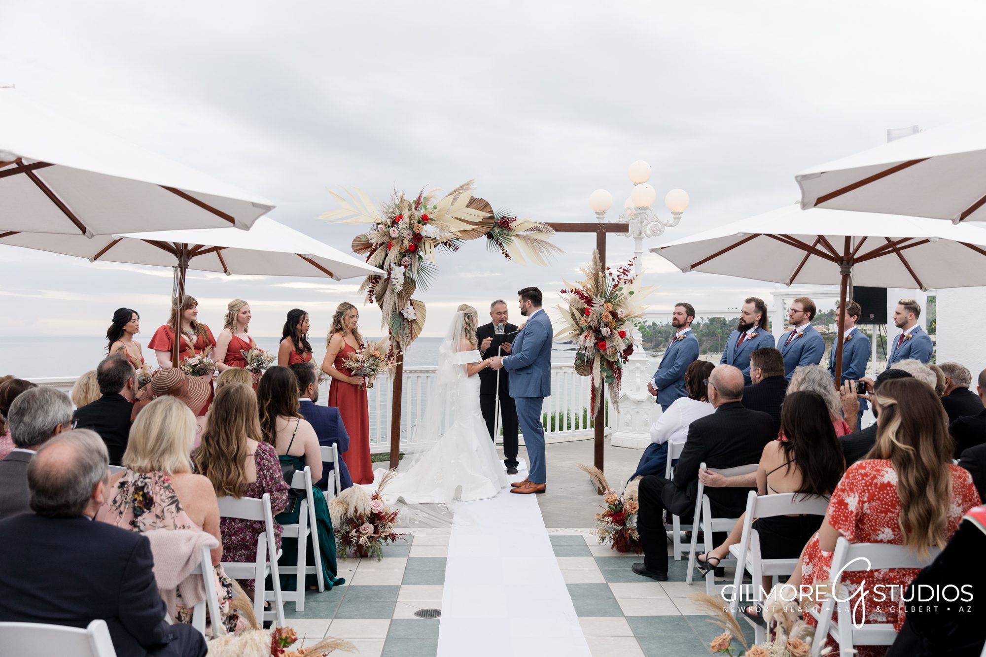 Occasions at Laguna Village fall wedding ceremony - photography Laguna Beach, CA wedding venue - Gilmore Studios - ocean front weddings