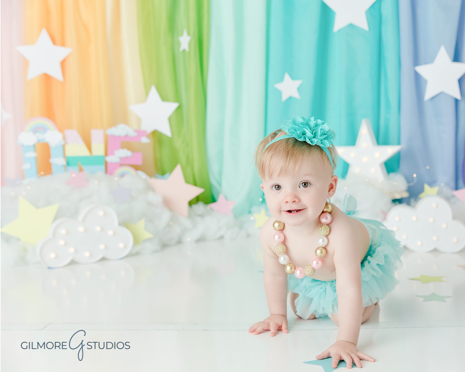 gilbert cake smash photographer, rainbow set, clouds, star, sky, one year old, girl, headband, 1st birthday, east valley childrens photography studio, gilmore studios, 1 year old portrait session, Queen Creek, Chandler, Scottsdale baby photo