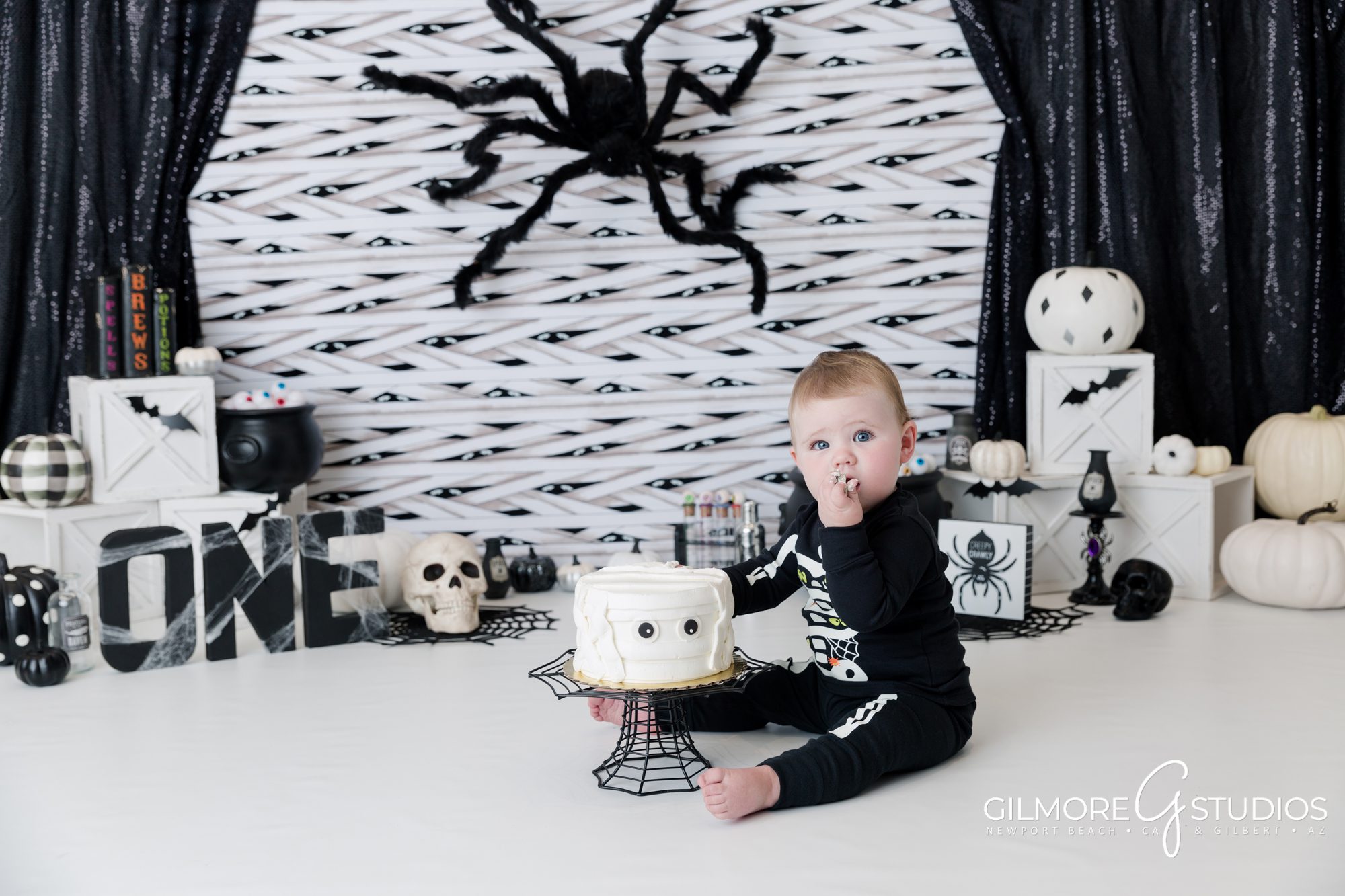 Halloween Cake Smash, Gilbert AZ photographer, East Valley, Queen Creek, Chandler, Scottsdale childrens portrait studio, spider webs, cobweb, pumpkin, mummy, jack-o-lantern, white pumpkin, mummy cake