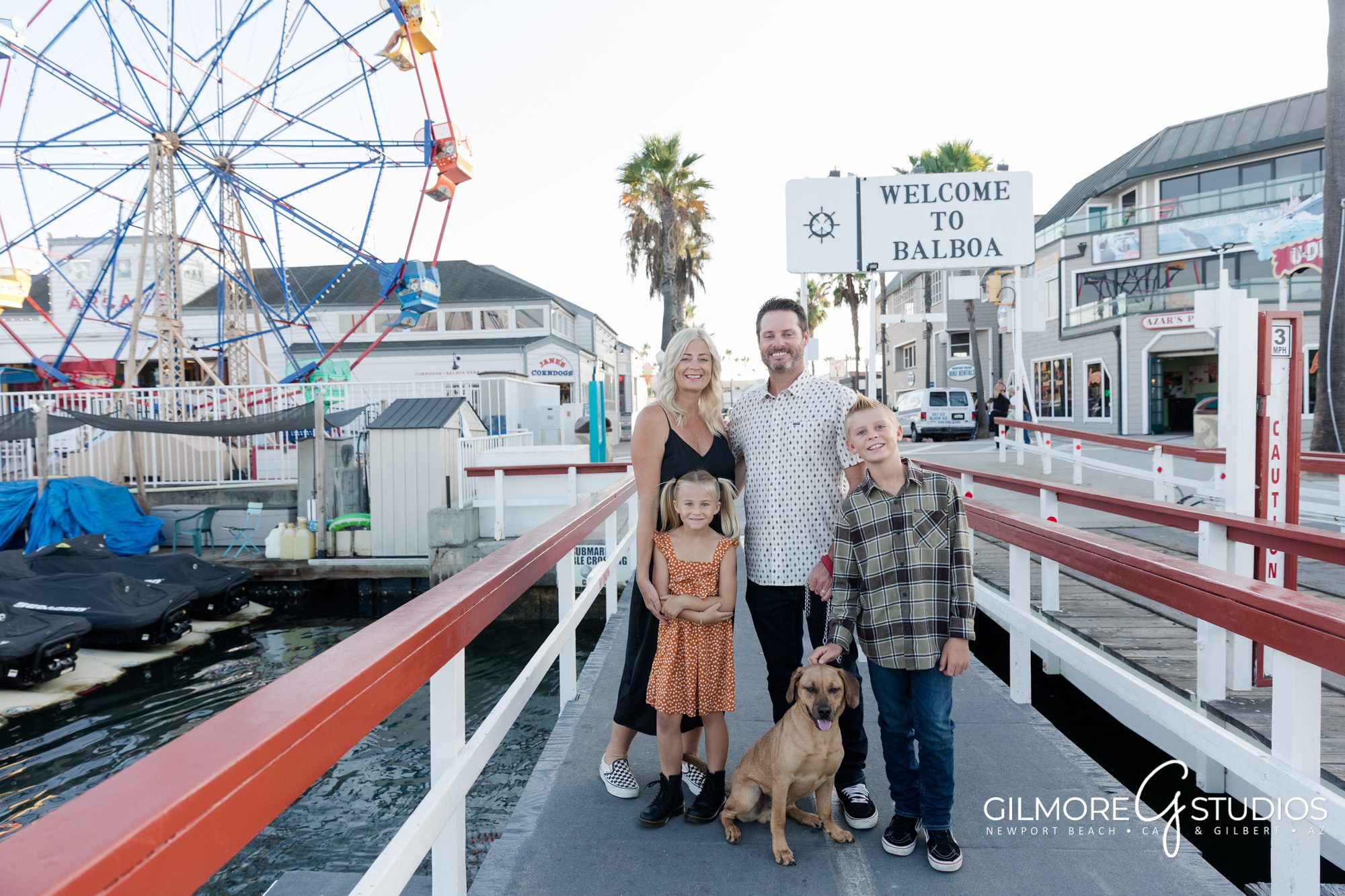 Balboa Fun Zone Family Portrait Photographer, Welcome to Balboa sign, Balboa Ferris Wheel, Balboa Ferry, pier, Jane's corn dogs, Balboa ice cream bar, Newport Beach, CA