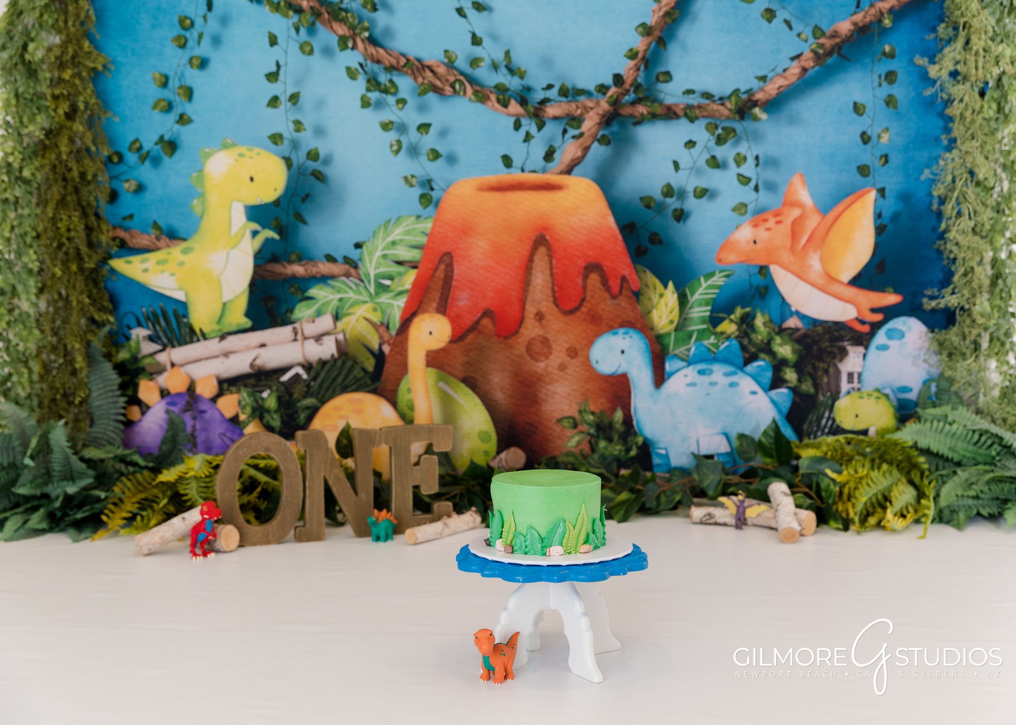 Dinosaur Cake Smash, volcano, jungle, one year old boy, smash cake, first birthday, custom set design, 1st year portrait session, gilmore studios, Gilbert AZ, Newport Beach, CA