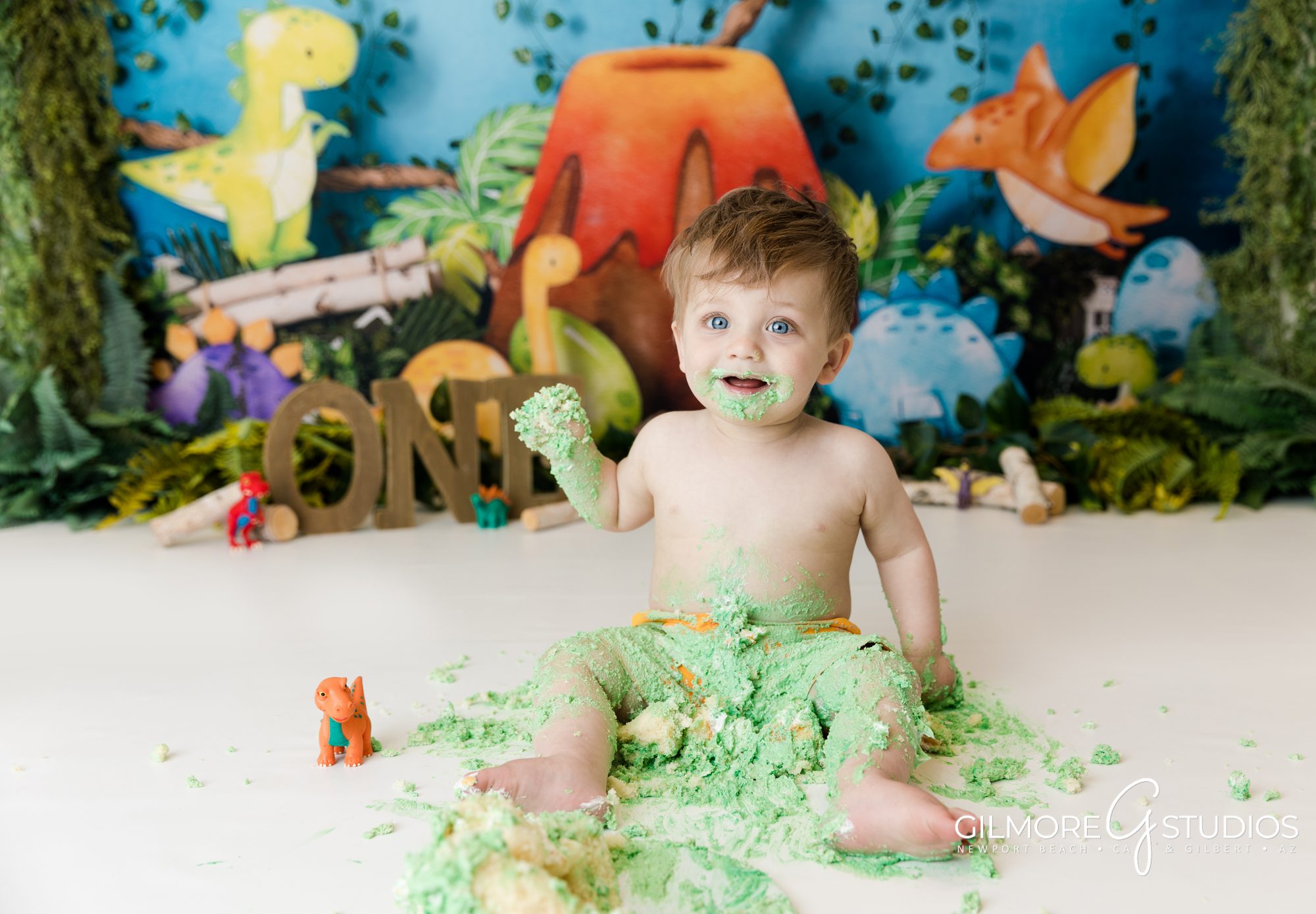 Dinosaur Cake Smash, volcano, jungle, one year old boy, smash cake, first birthday, custom set design, 1st year portrait session, gilmore studios, Gilbert AZ, Newport Beach, CA