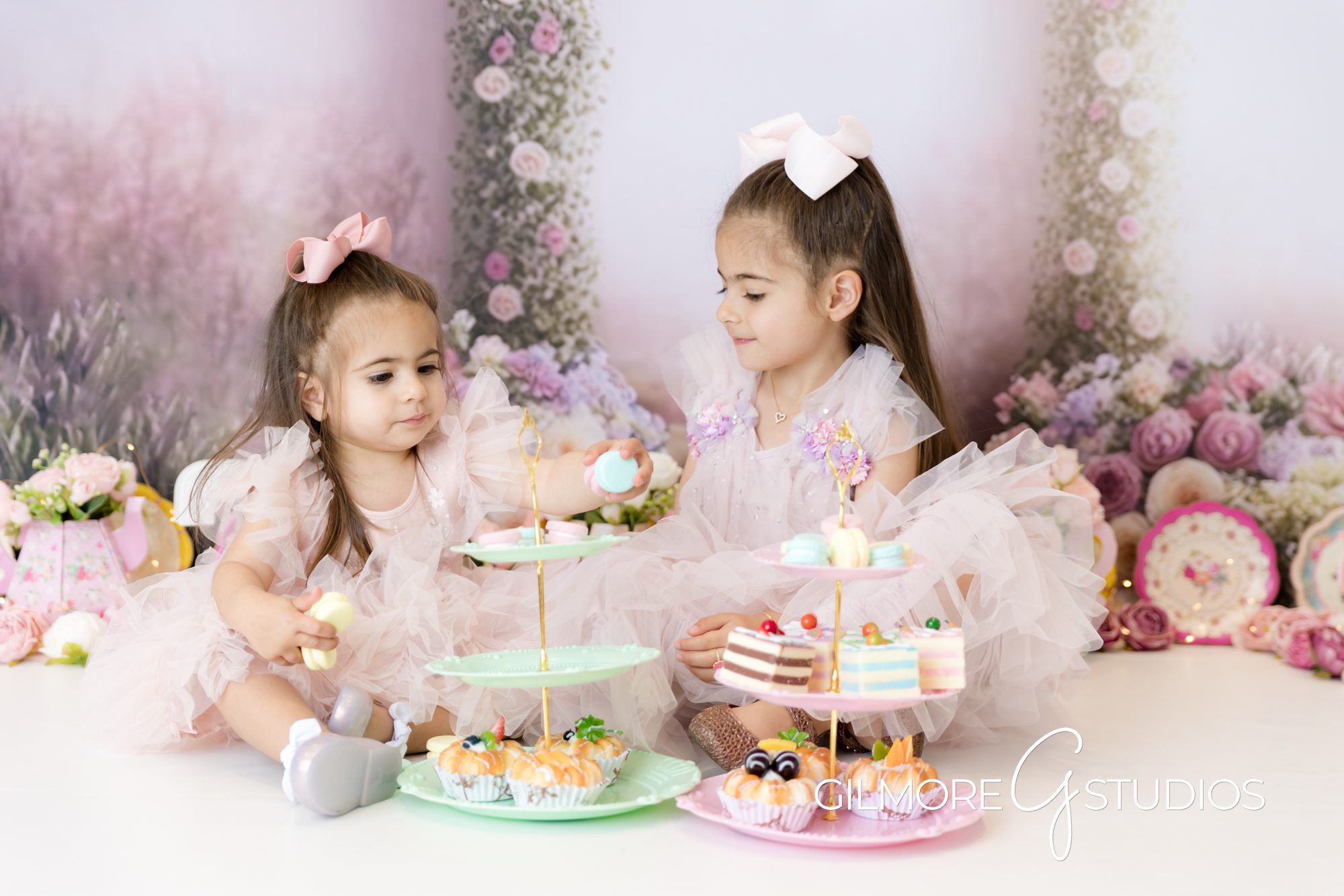 tea party cake smash, little girls, sisters, big sister, little sister, pink bows, tea party, cake, sweets, treats, gilmore studios