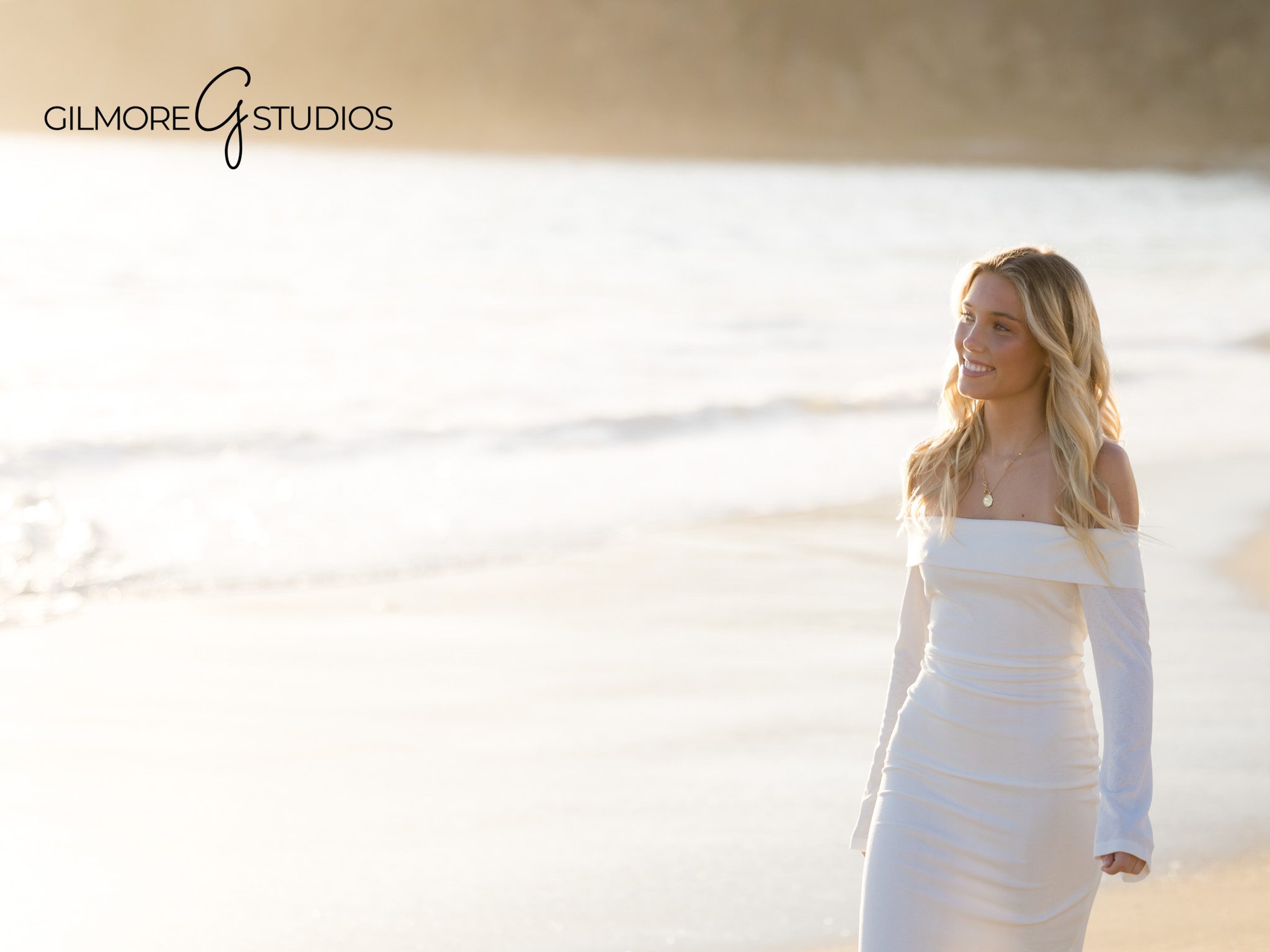 Laguna Beach senior portrait, reflecting ocean, serene sunset lighting