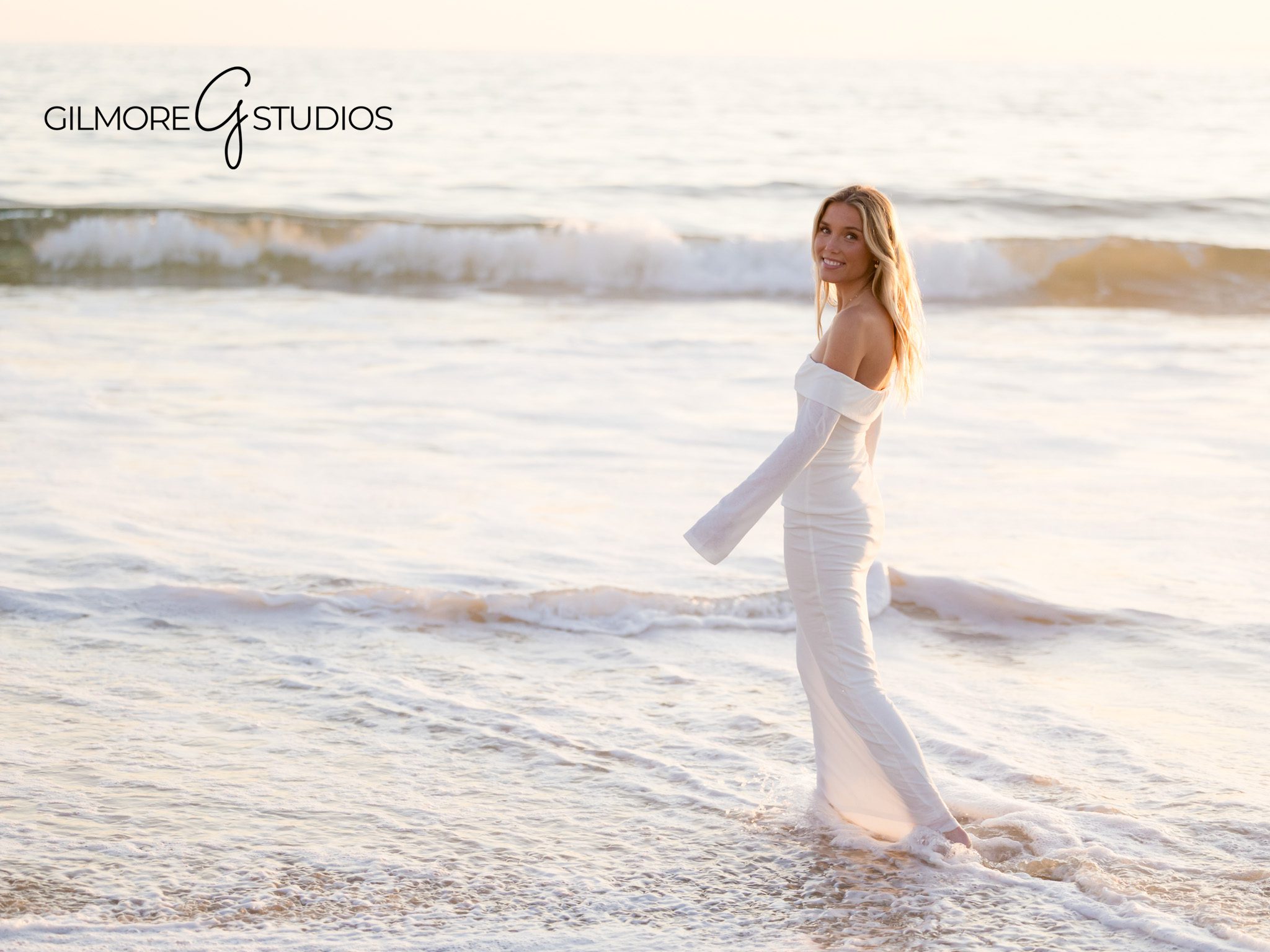 Beachside senior portraits at Laguna Beach, coastal cliffs, golden hour glow