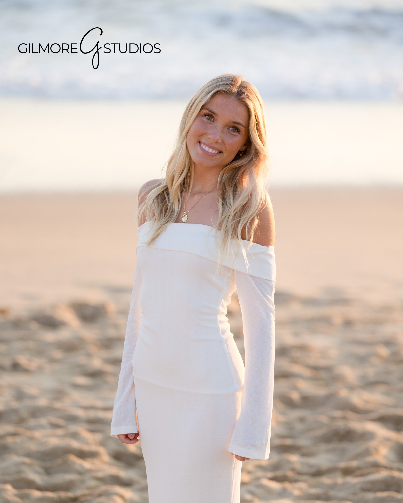 Golden hour, senior portrait, Laguna Beach, waves, rocky shore
