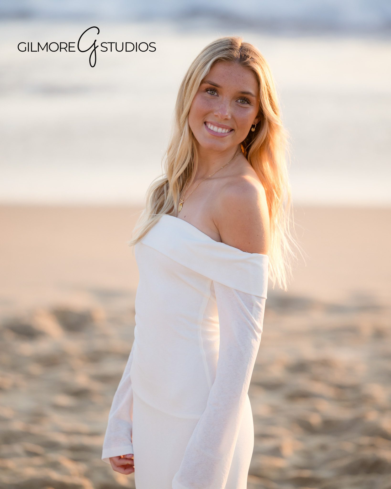 Laguna Beach senior portrait session, waves, surf, and sunset reflection on water