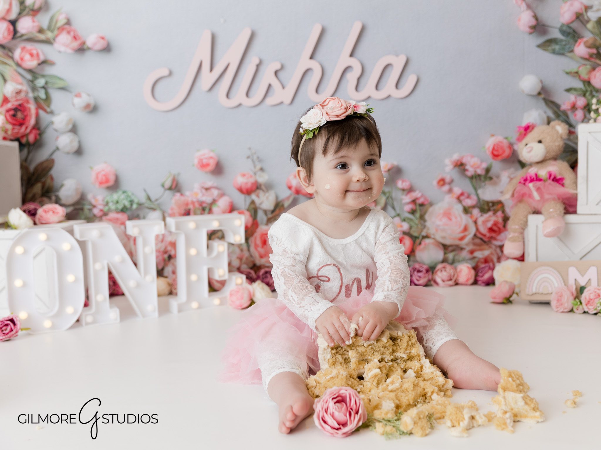 Smiling baby surrounded by flowers, Orange County photographer, birthday session