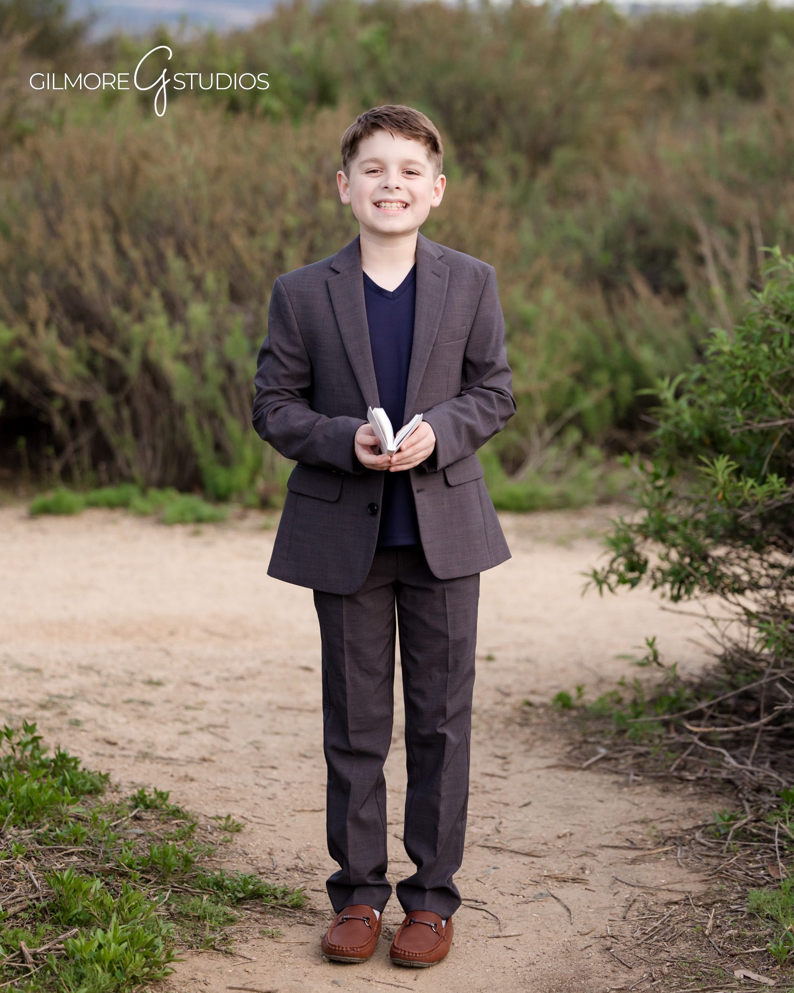 Child Holding Bible - Gray Coat - Beach Photography