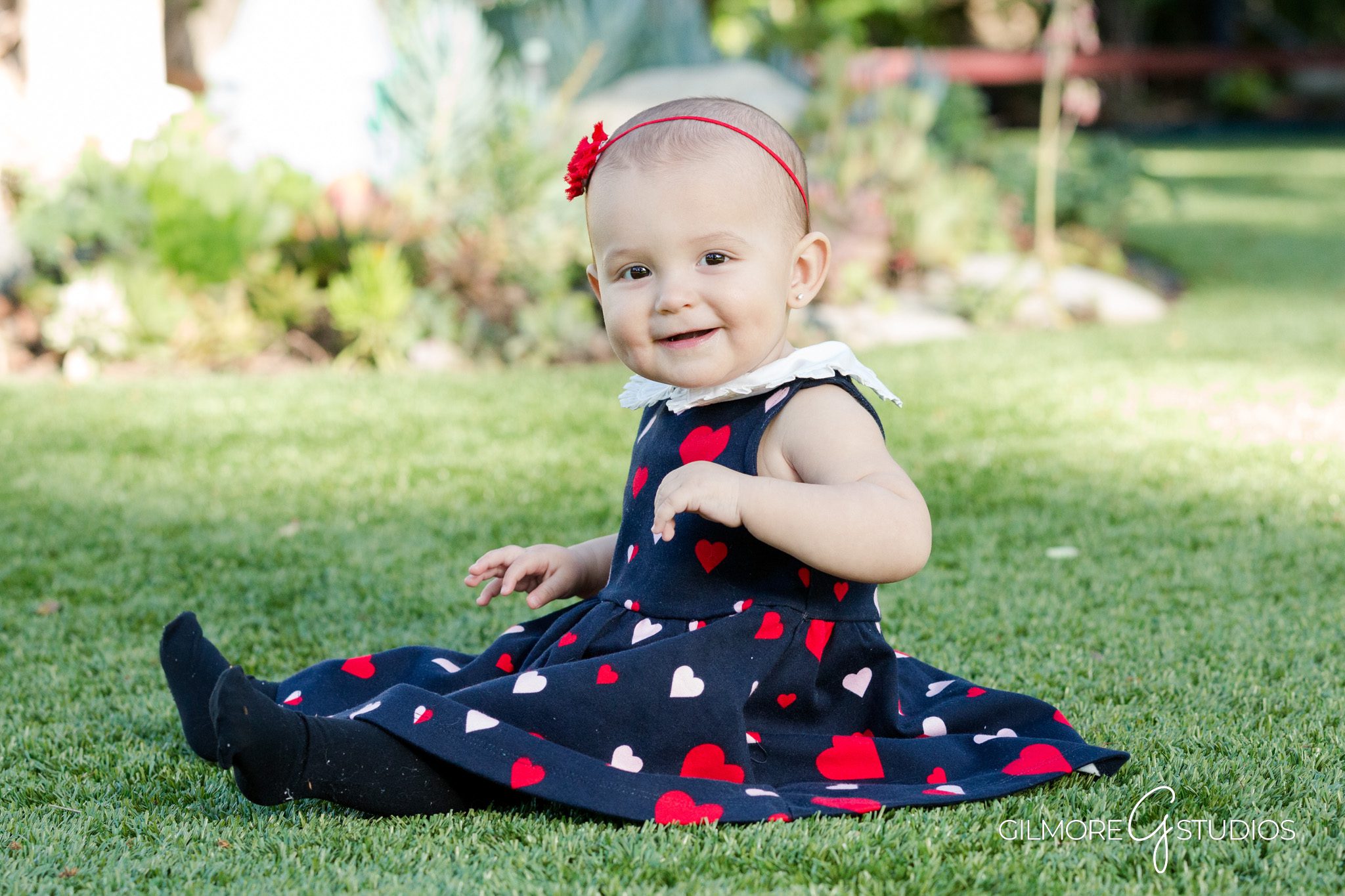 Cute Baby Portrait – Heart Garland – Sitting Milestone Photo