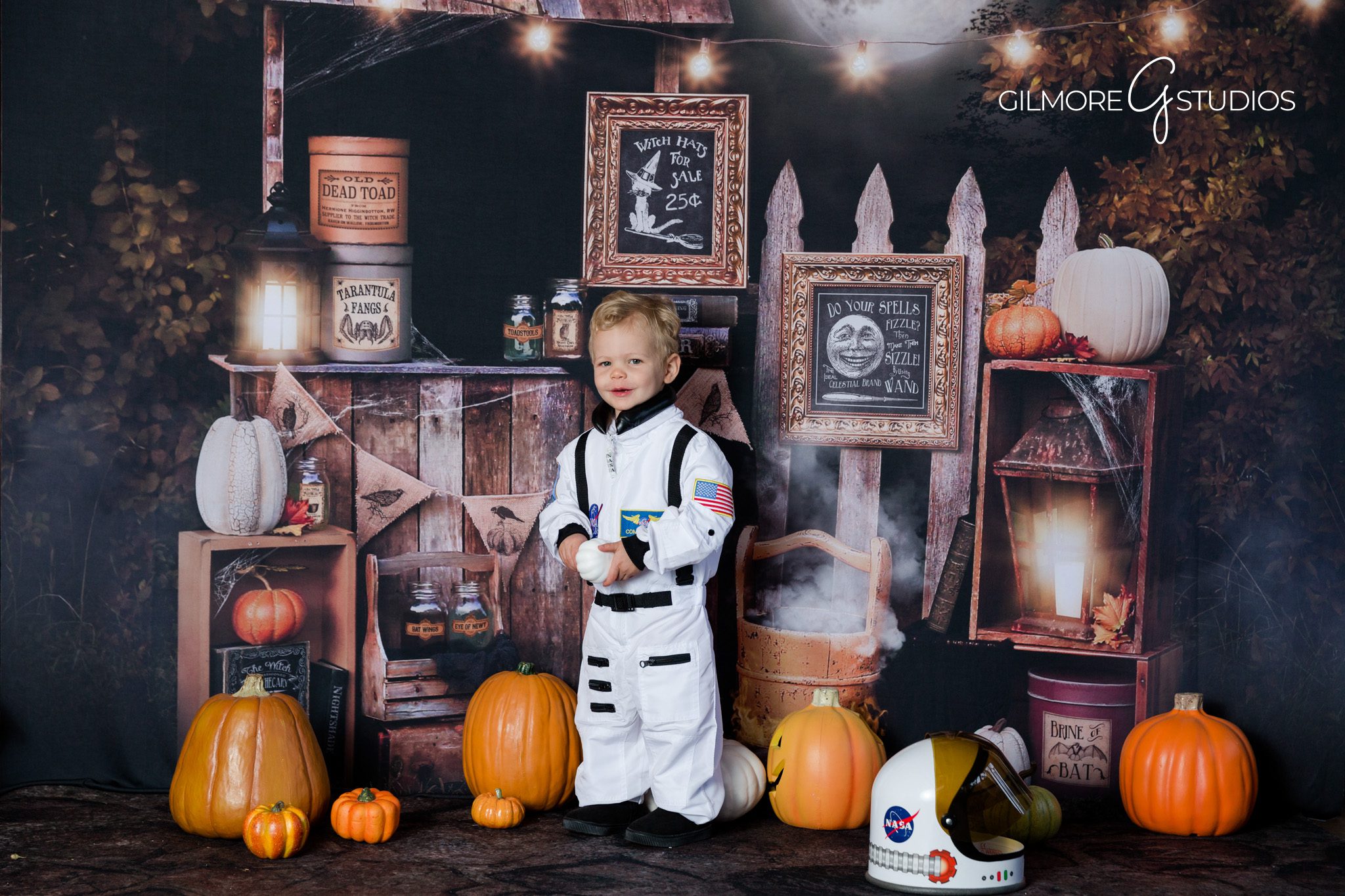 Halloween child photo – costume and cauldron – potion setup