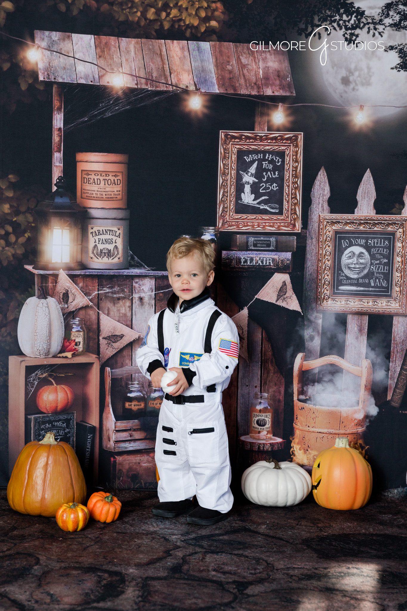 Child Halloween session – potions backdrop – studio photo