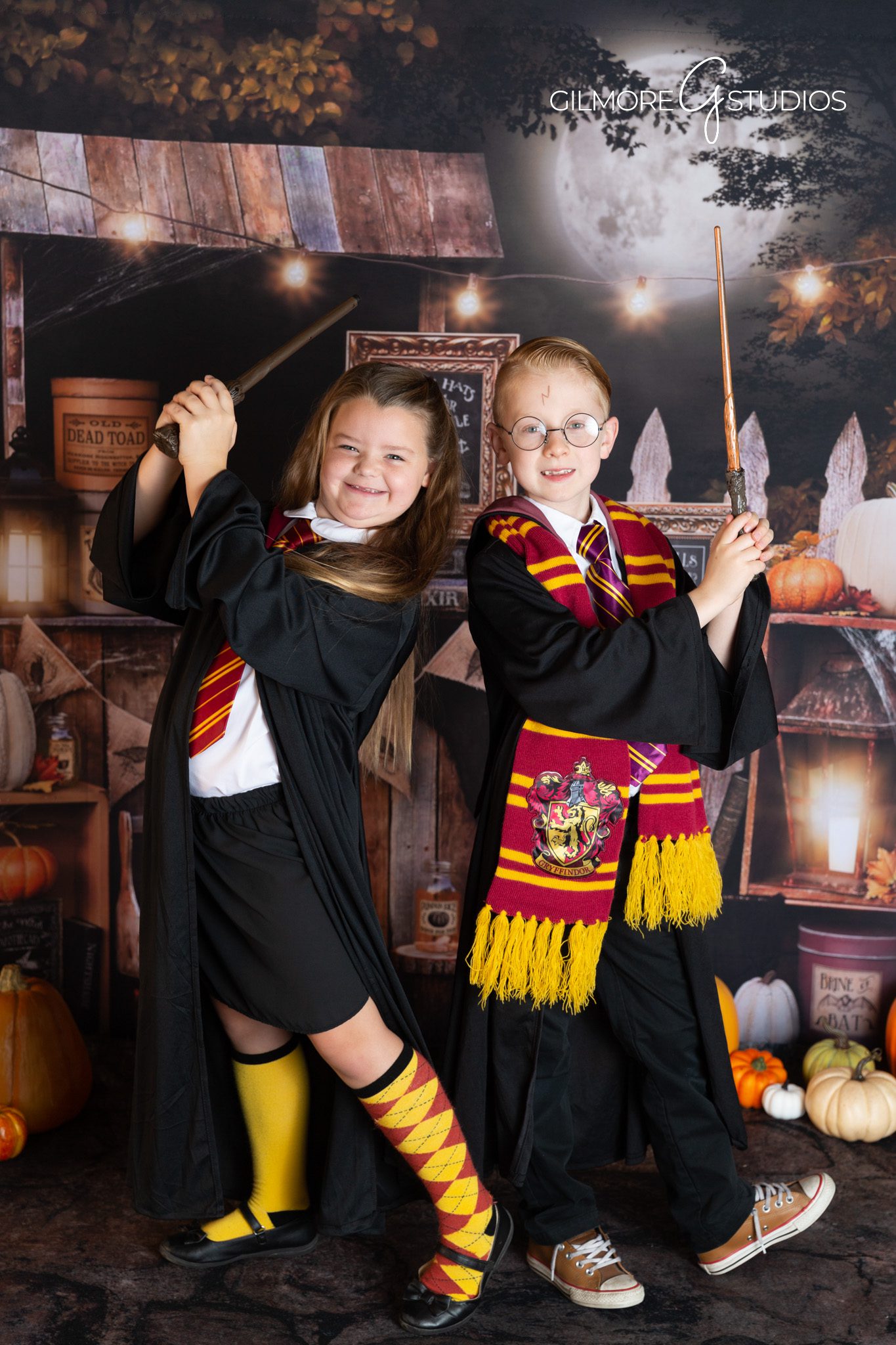 Halloween potions backdrop – child in wizard costume – Gilmore Studios