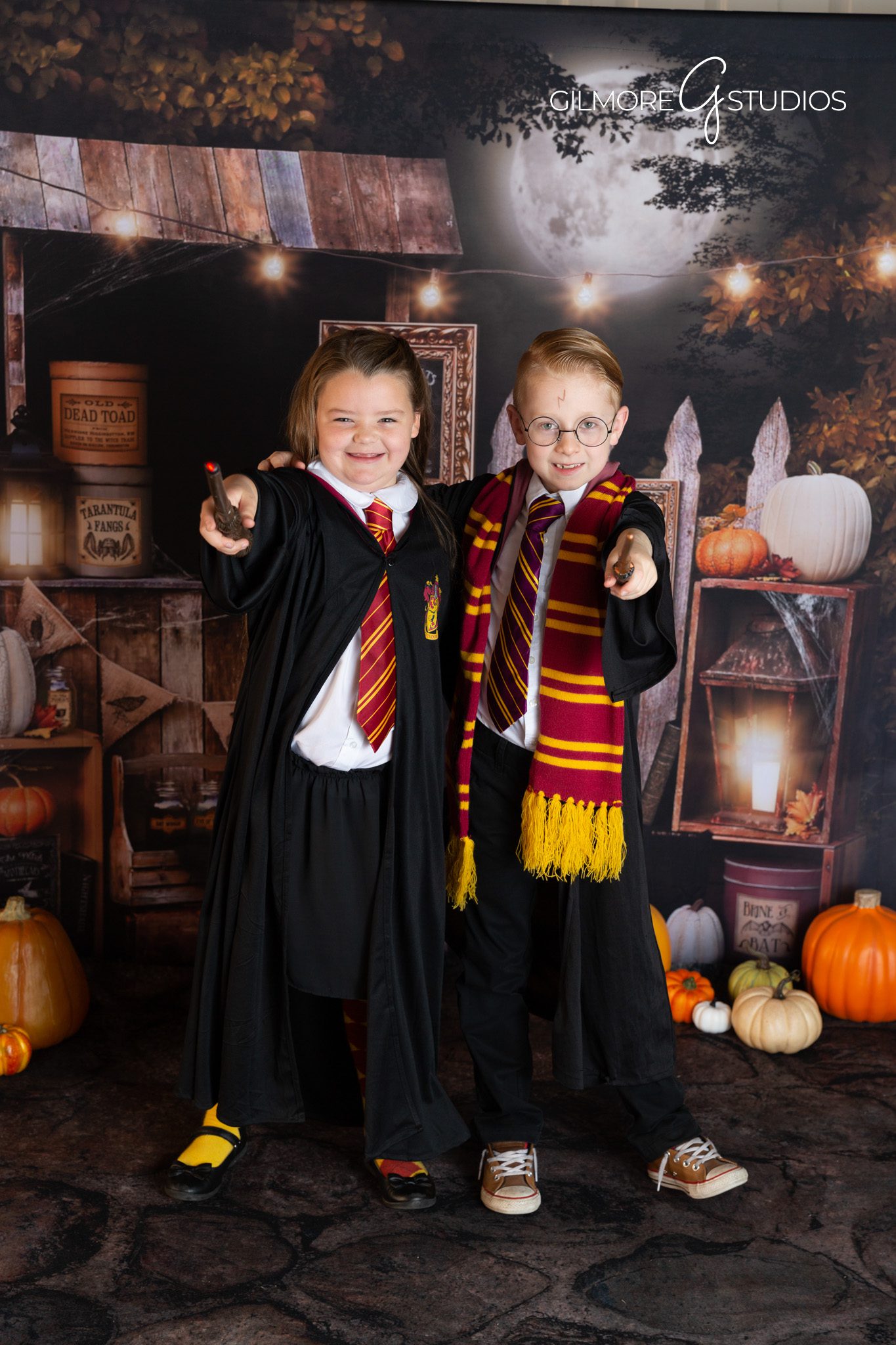 Child with wand – potions scene – Gilmore Studios Halloween shoot