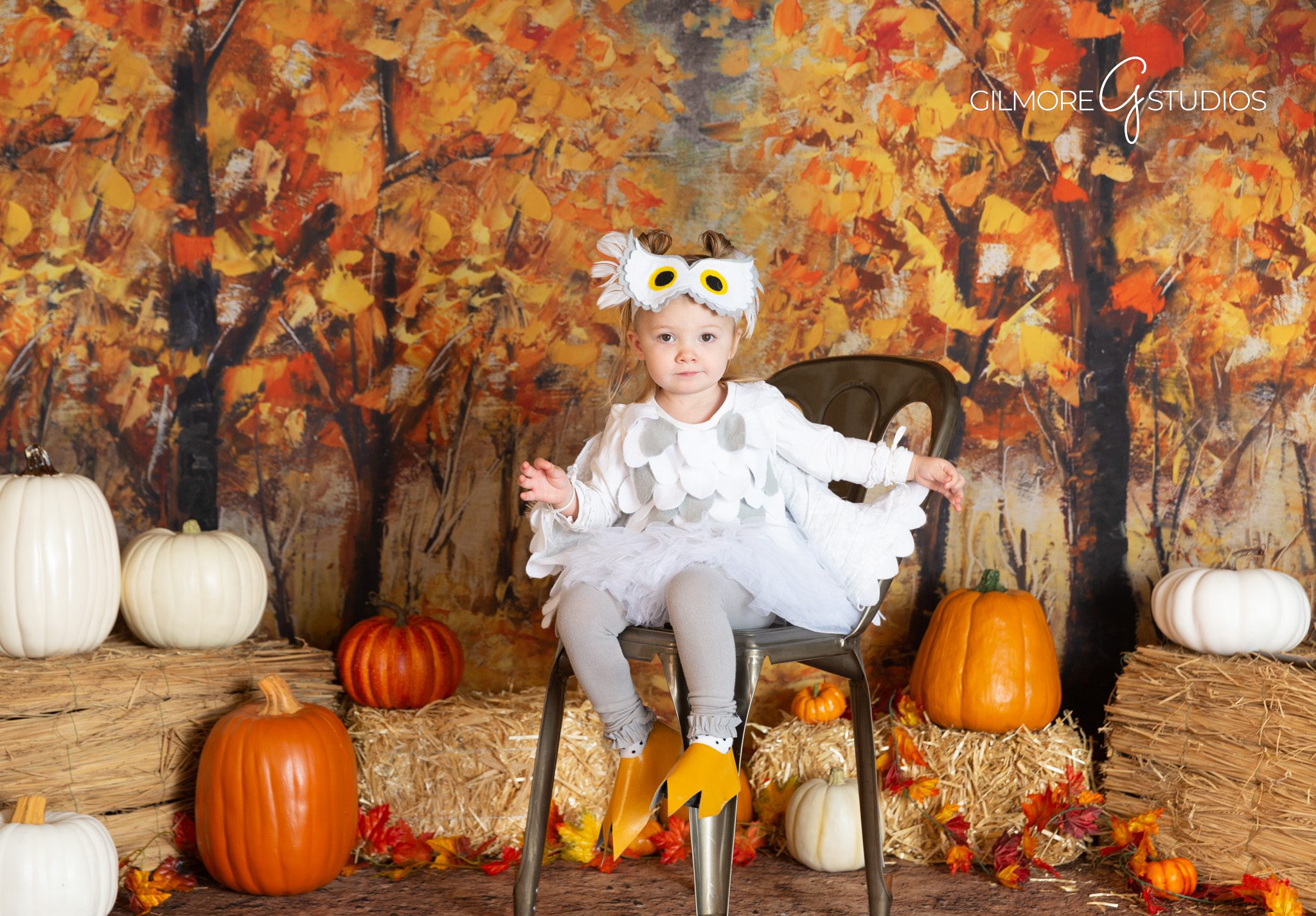 Halloween theme portrait – wand and spell book – Gilmore Studios