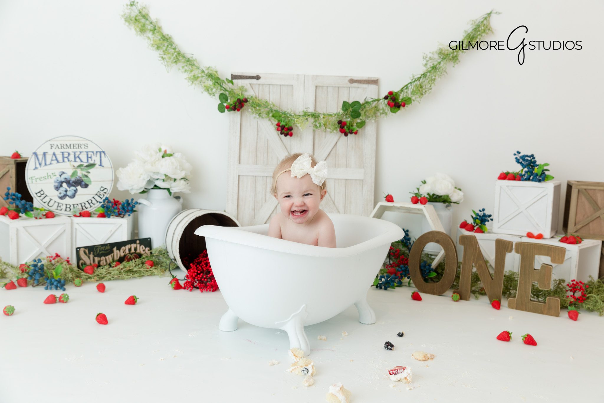 Strawberry-themed baby photo – birthday milestone – cute and clean setup