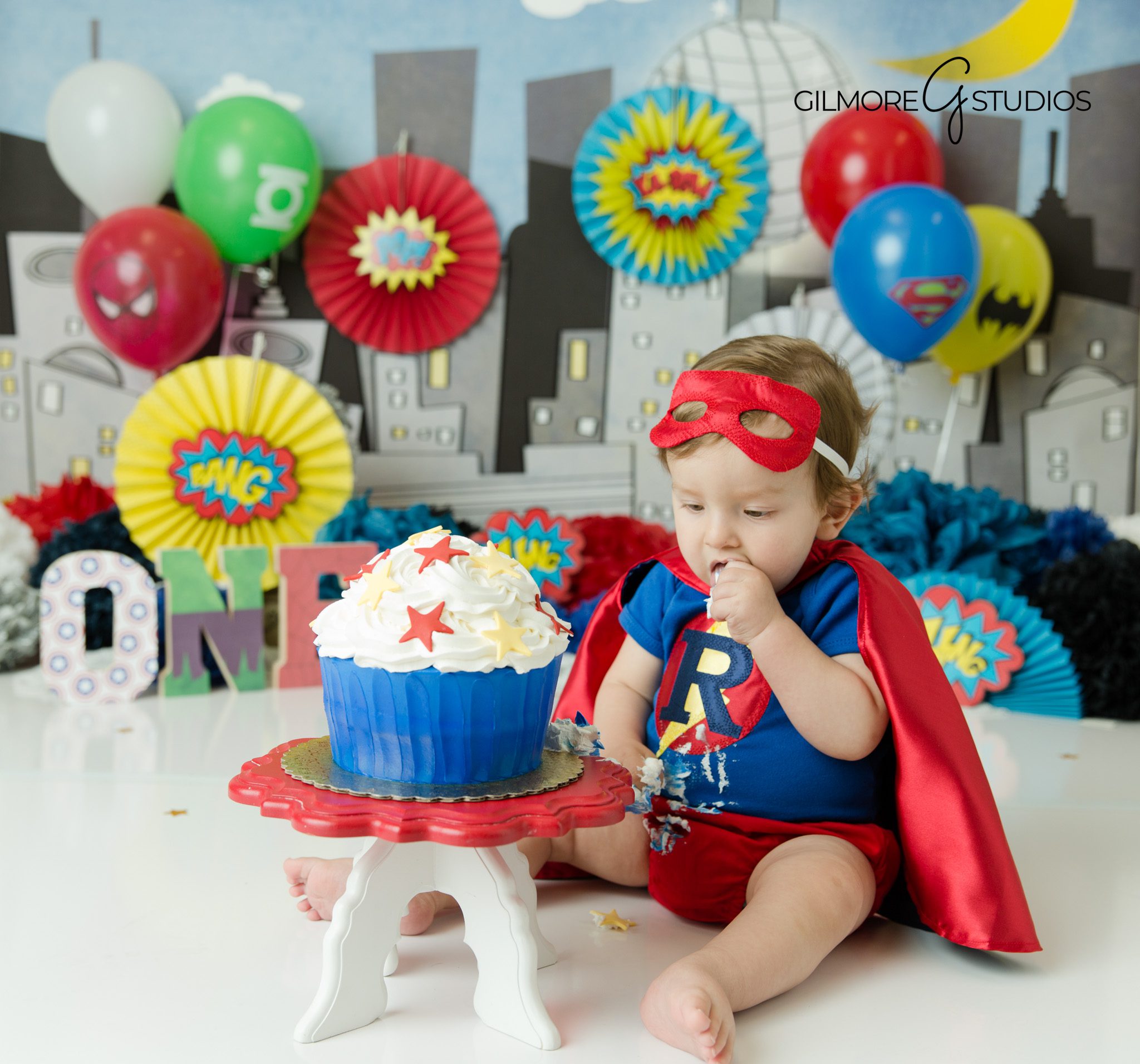 Bold-Superhero-Backdrop-Cake-Smash-Photo
