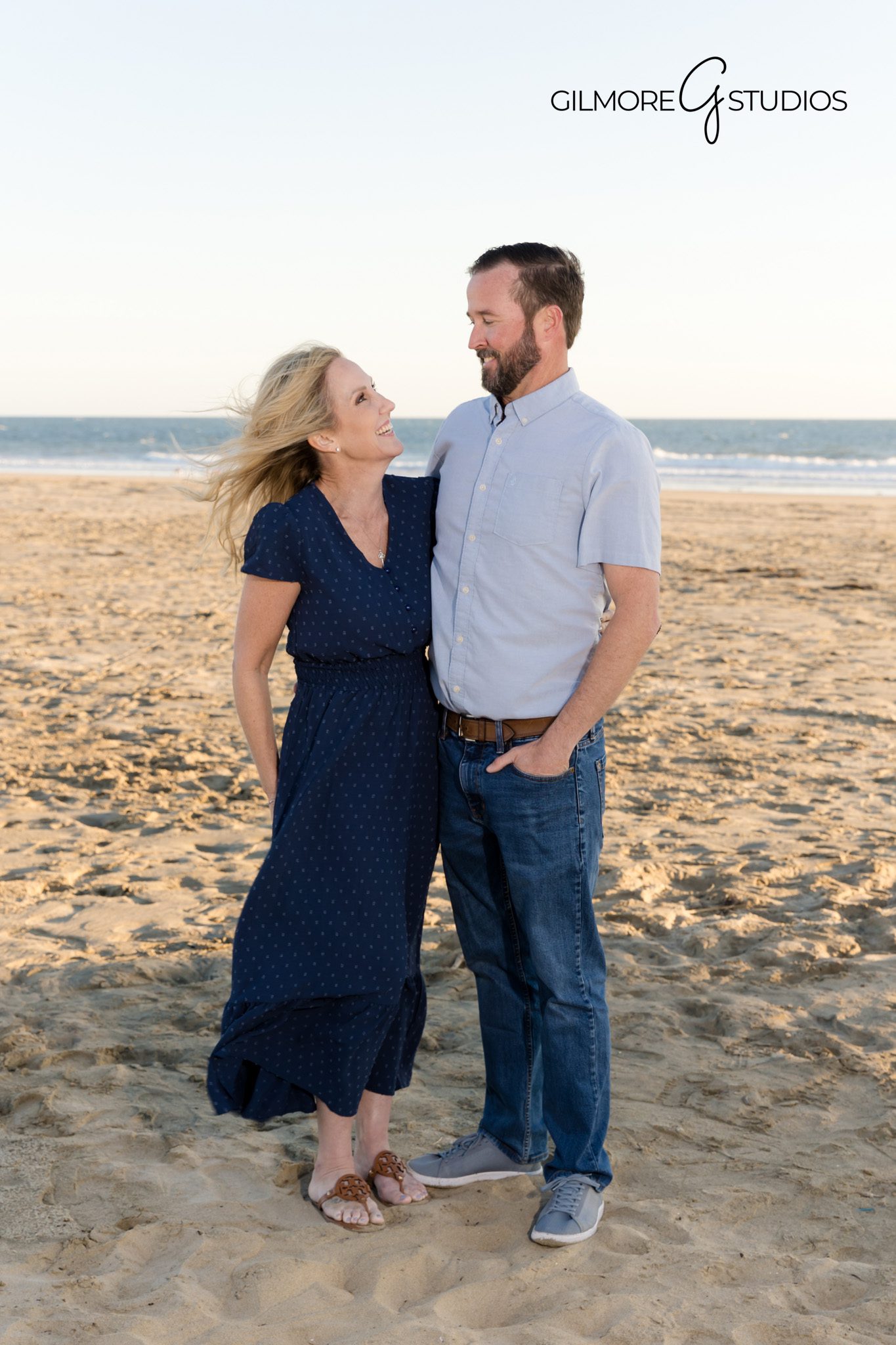 Beach family portraits with casual outfits