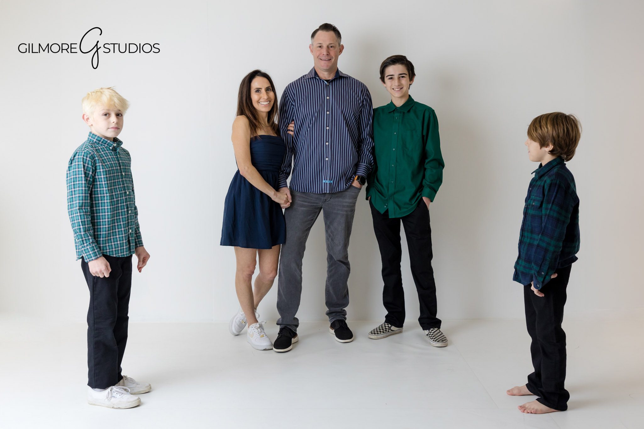 family of five studio photo shoot, Newport Beach indoor photographer, large family portrait in studio, neutral backdrop session
