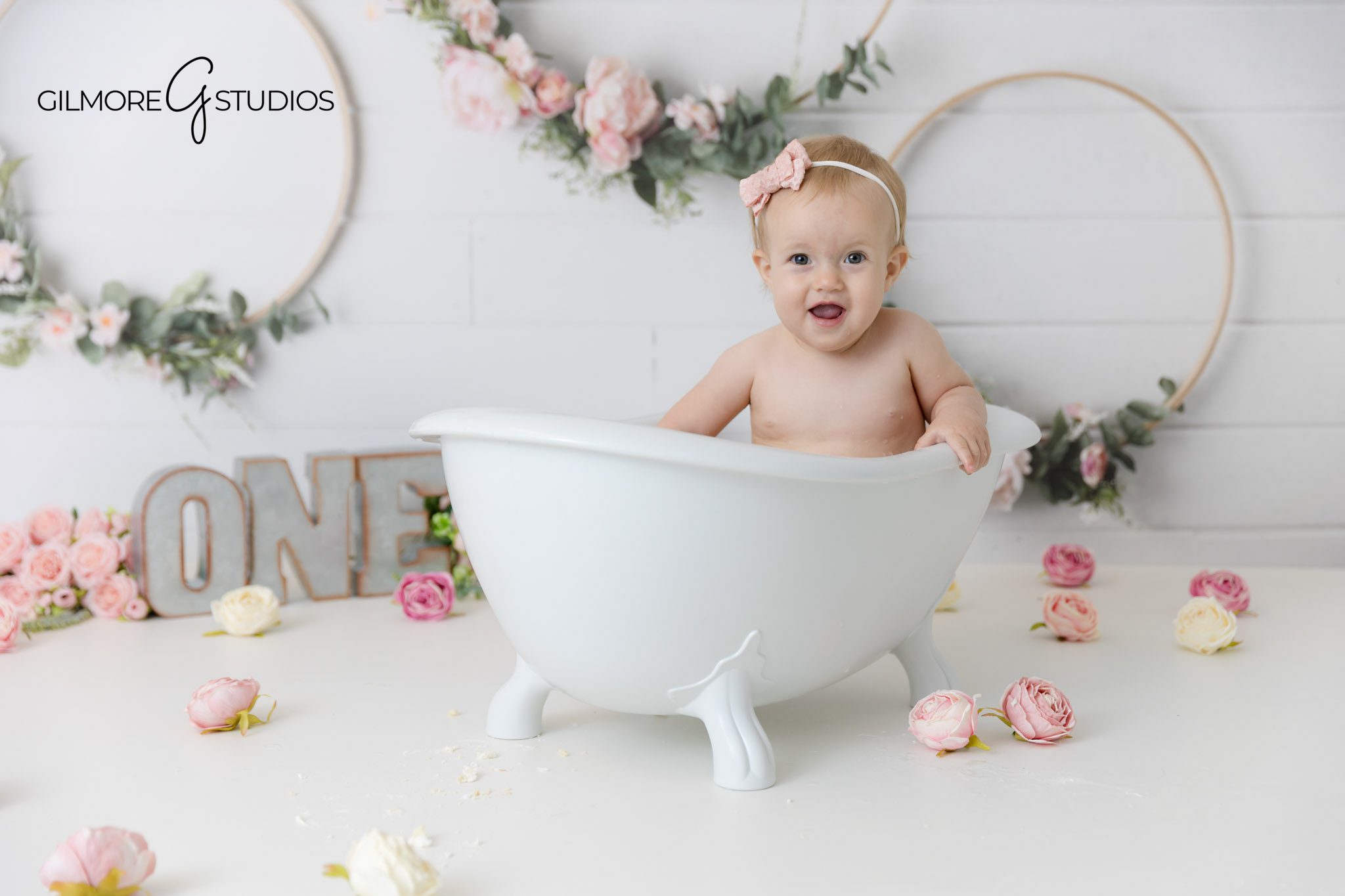 Baby girl birthday photography with themed cake and outfit Mesa AZ, Arizona portrait photographer showcasing baby’s cake smash celebration