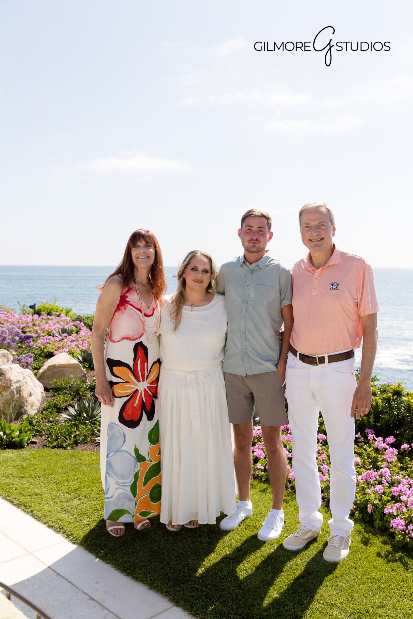Corona del Mar engagement party portraits with garden backdrop, Photography of stylish engagement party with friends and family