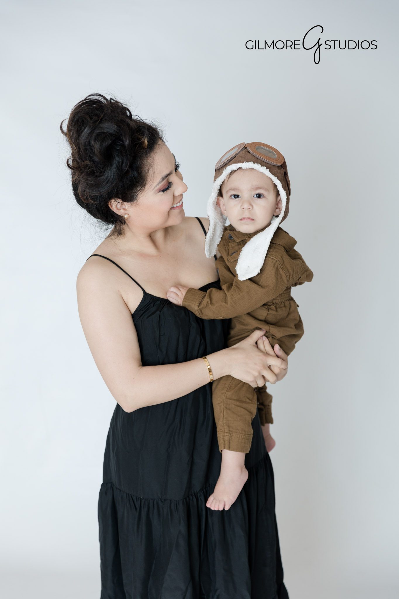 Gilbert AZ cake smash photographer Grey Time Flies theme baby boy first birthday portraits, Baby boy birthday cake smash Gilbert Arizona studio photographer milestone session